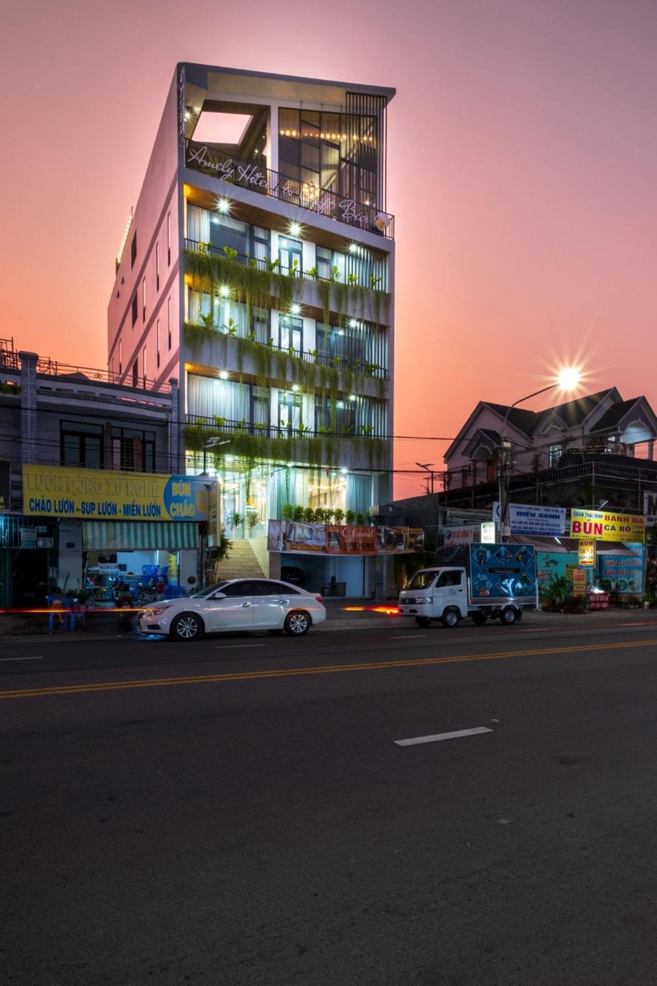 Amely Hotel Ben Cat Exterior photo